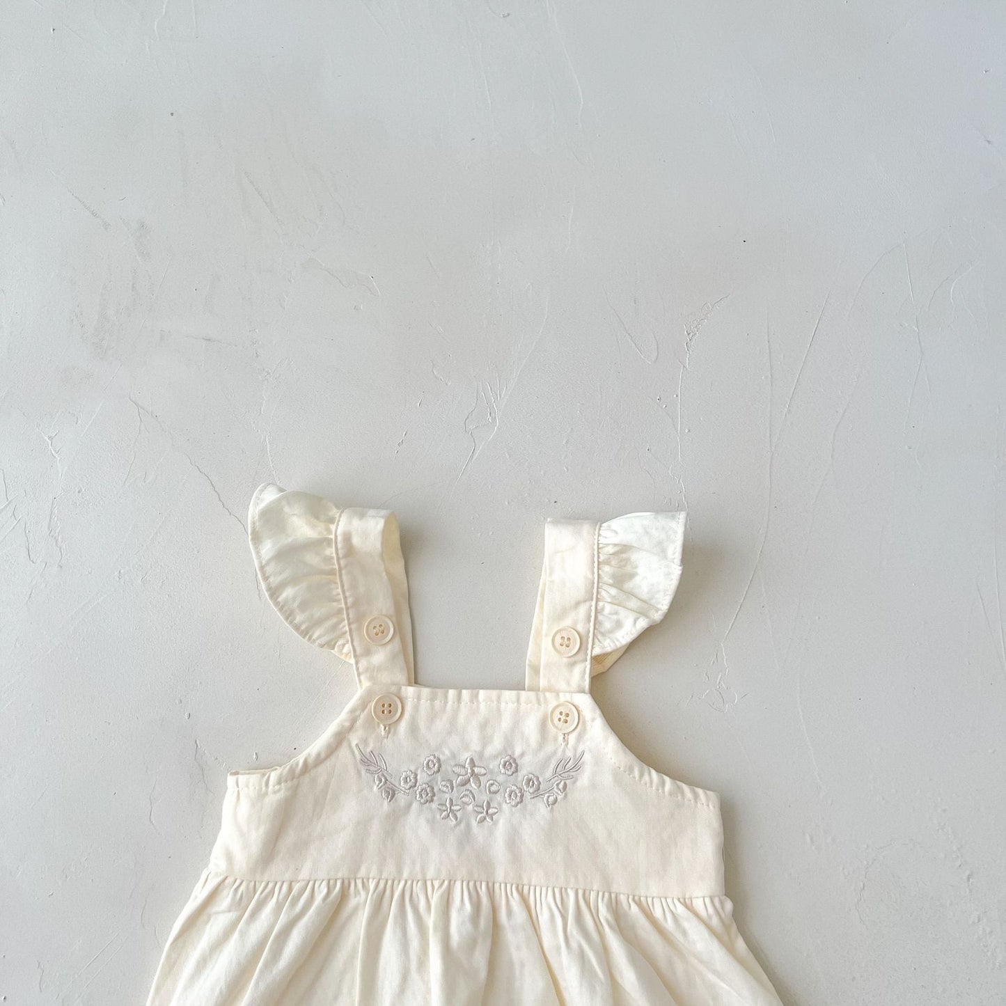 Vintage-Inspired Suspender Romper